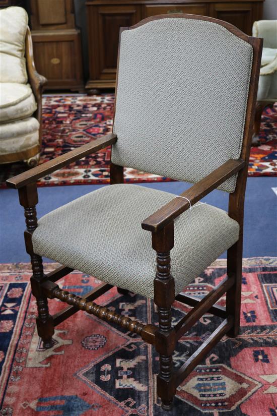 A set of ten oak dining chairs (two having arms)